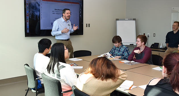 Dr. Thiessen presents to high school class