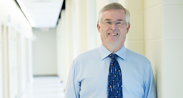 Dr. David Bailey standing in hallway