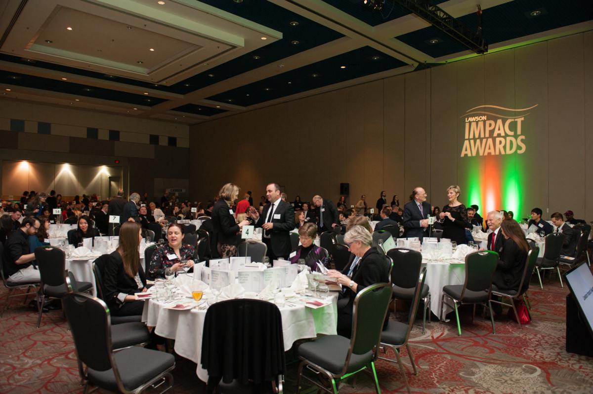 Lawson Impact Awards evening event with guests at tables